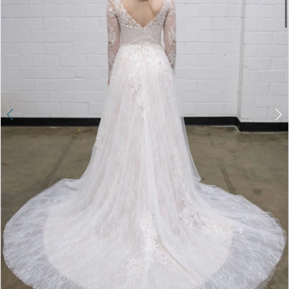Size 22 ivory Tania Olsen wedding dress with sleeves